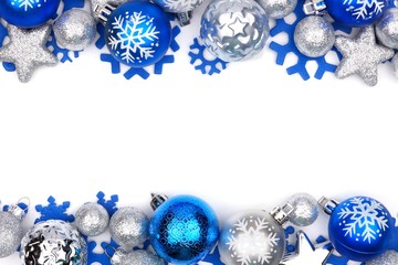 Christmas double border of blue and silver ornaments isolated on a white background