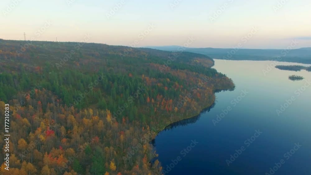 Aerial View.A large lake among the hills.Autumn evening Aerial View.A large lake among the hills.Autumn evening