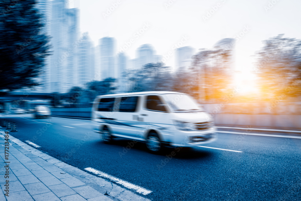 cars driving on inner city road of shanghai, china, asia. cars driving on inner city road of shanghai, china, asia.
