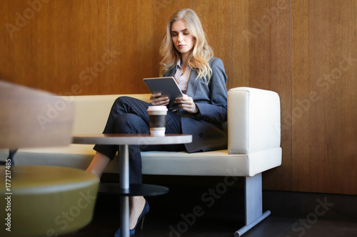 Young businesswoman with ta...
