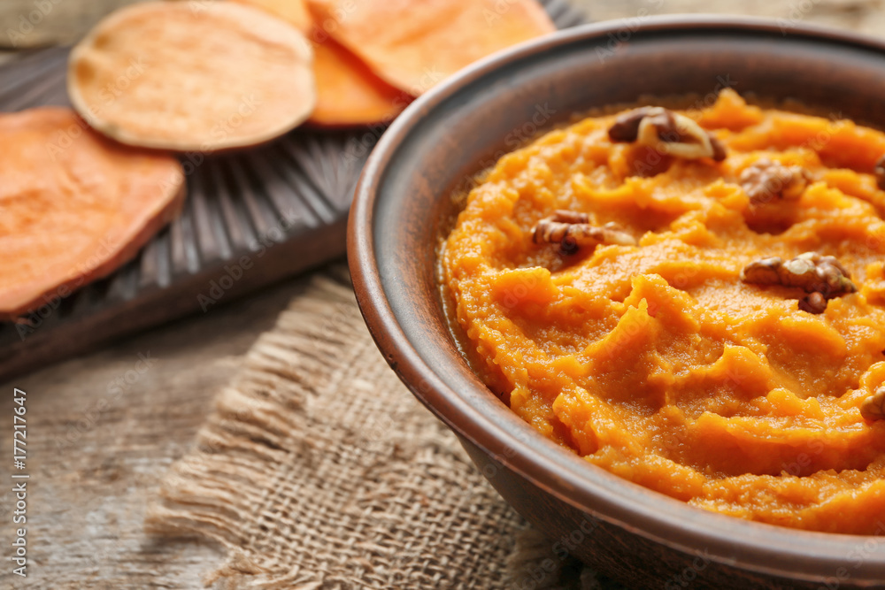 Bowl with mashed sweet potato on table Bowl with mashed sweet potato on table
