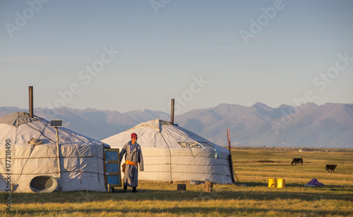 Tableau sur toile Mongolian gers in a landscape at sunrise