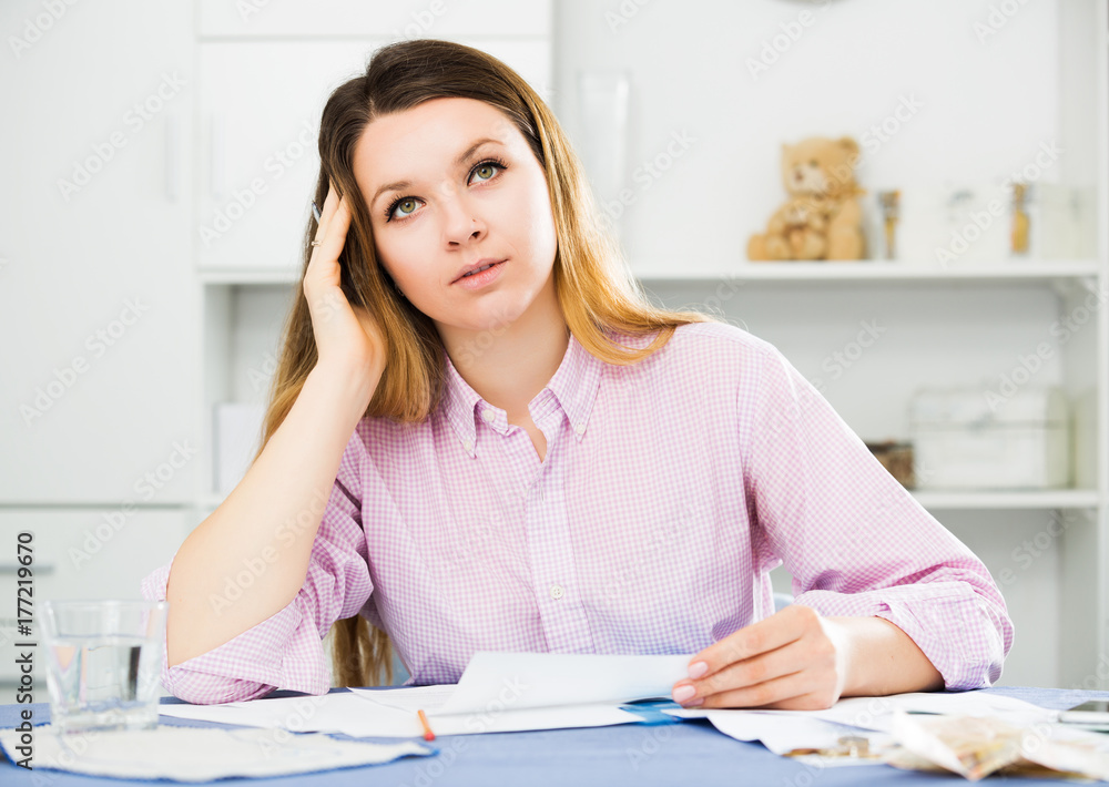 Girl signing agreement papers