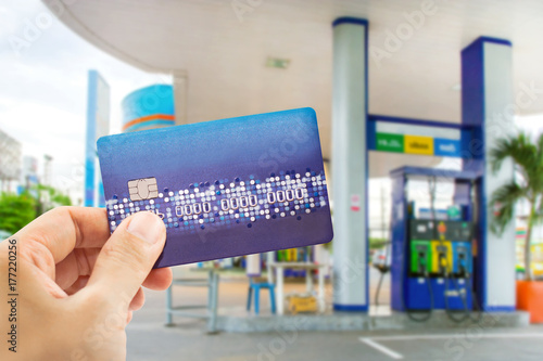 Credit card to make a payment for refueling car on gas station