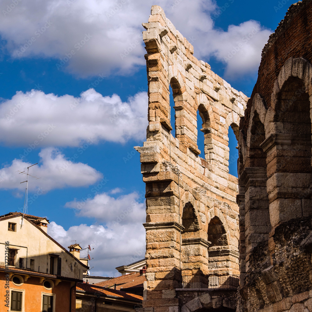 a part of external wing of arena in Verona Italy. Shooted in a september noon with blue sky and white cloud