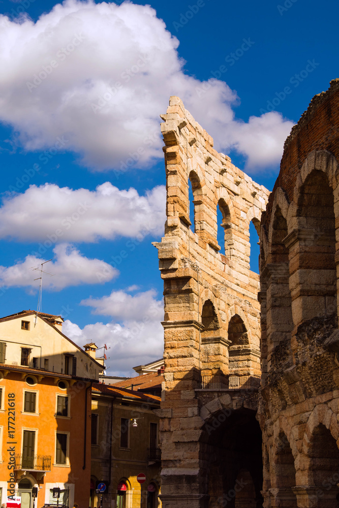 a part of external wing of arena in Verona Italy. Shooted in a september noon with blue sky and white cloud