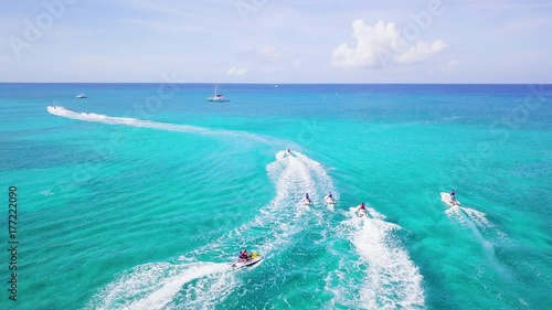 aerial footage of turquoise waters on the tropical paradise of the cayman islands in the caribbean