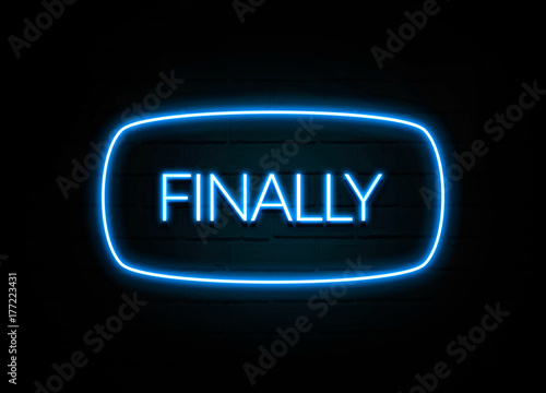 Finally  - colorful Neon Sign on brickwall photo