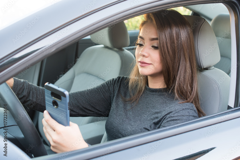 Teen Girl Driving Car While Texting