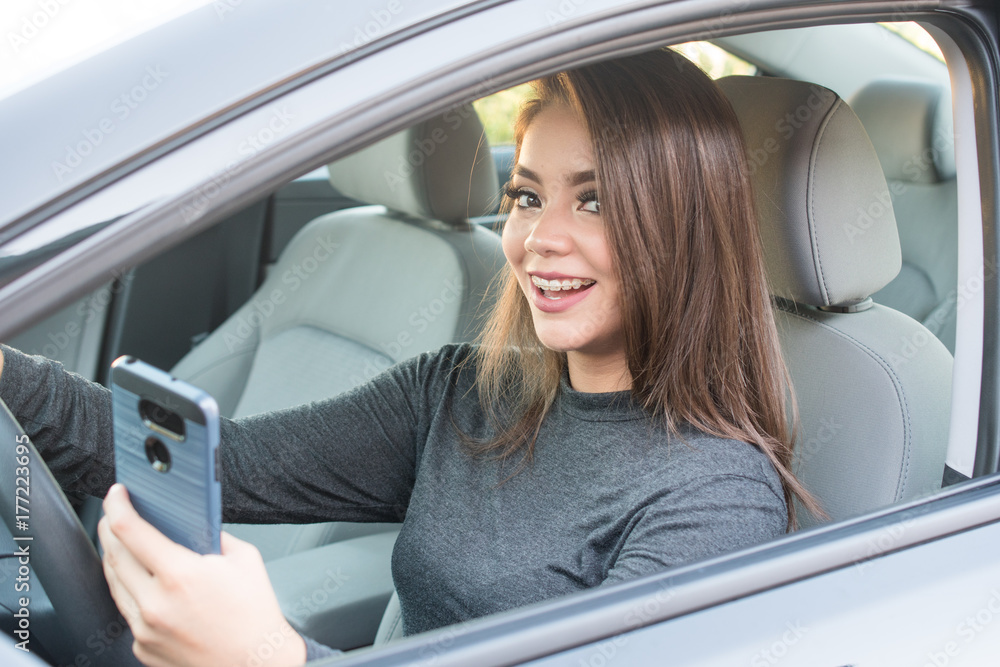 Teen Girl Driving Car While Texting