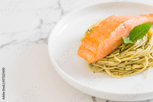 pasta spaghetti with pesto green and salmon