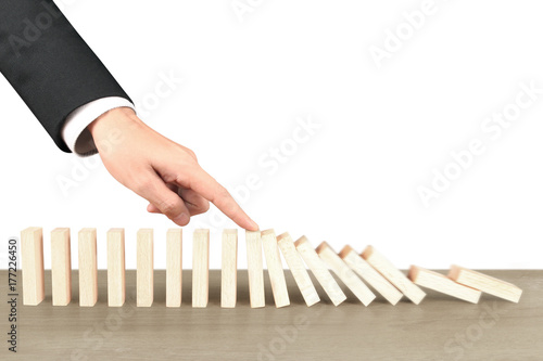Hand Stopping domino concept