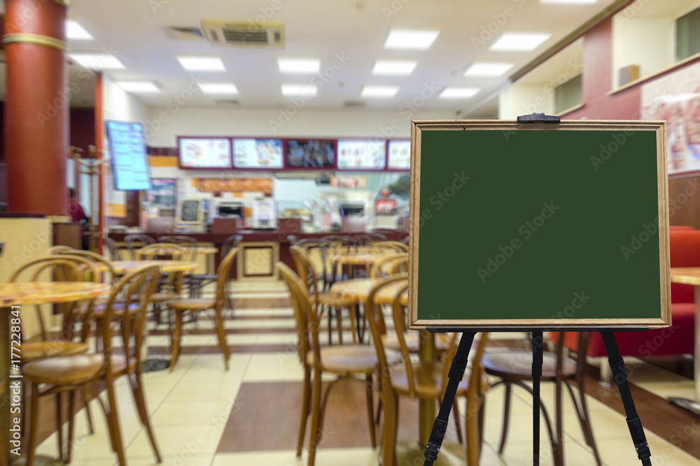 Cafe or restaurant in anticipation of visitors. Defocused image. Copyspace or place for your text in the foreground. Cafe or restaurant in anticipation of visitors. Defocused image. Copyspace or place for your text in the foreground.