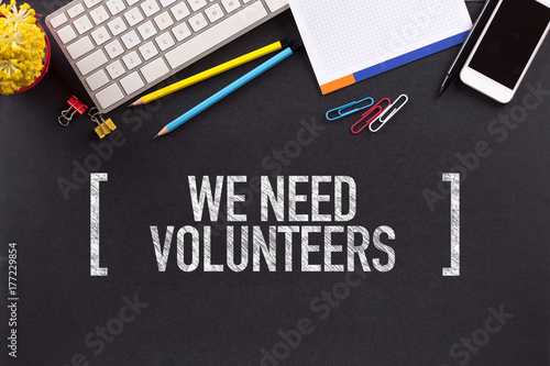 WE NEED VOLUNTEERS CONCEPT ON BLACKBOARD