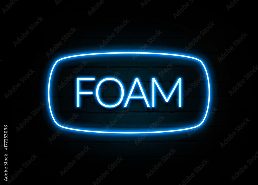 Foam - colorful Neon Sign on brickwall Foam - colorful Neon Sign on brickwall