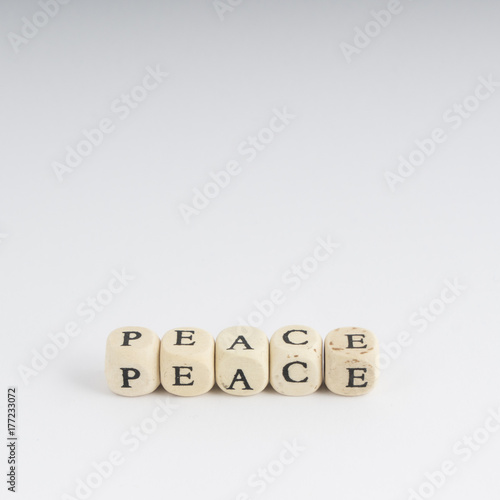 formation of the word Peace with nuts containing the letters