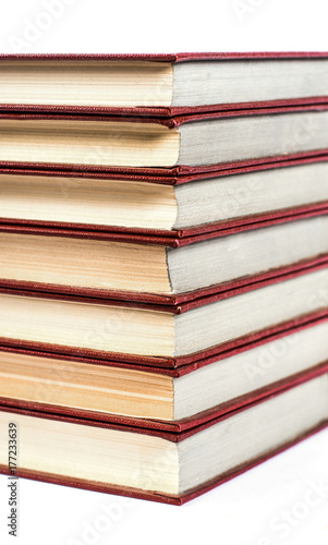 A pile of books on white background isolated