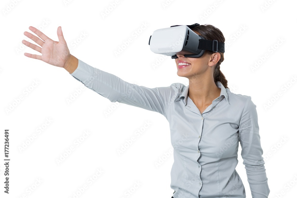 Female executive using virtual reality headset Female executive using virtual reality headset