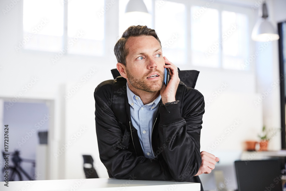Man talking on phone Man talking on phone