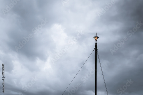 lightning rod and cloudy sky