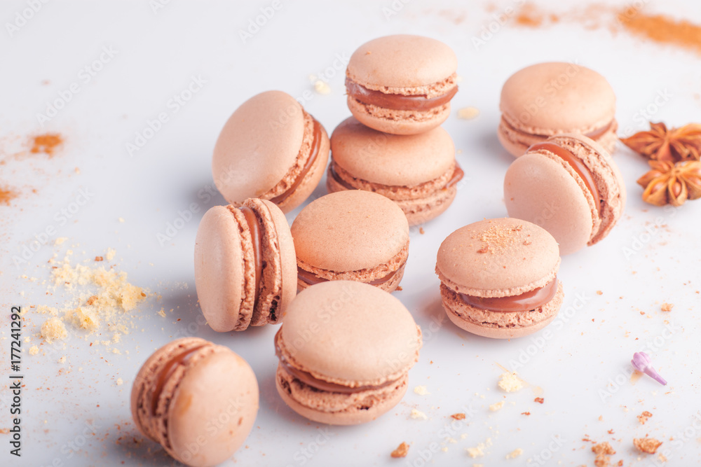 sweet french macaroon on white isolated white background. fly falling sweet macaron sweet french macaroon on white isolated white background. fly falling sweet macaron