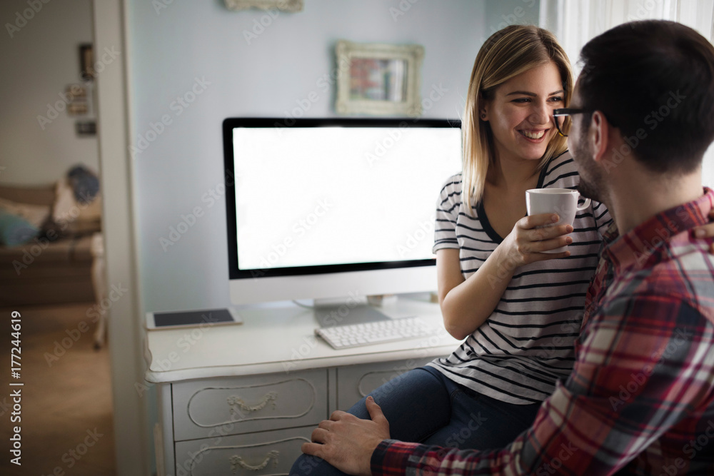 Portrait of attractive young couple of designers Portrait of attractive young couple of designers