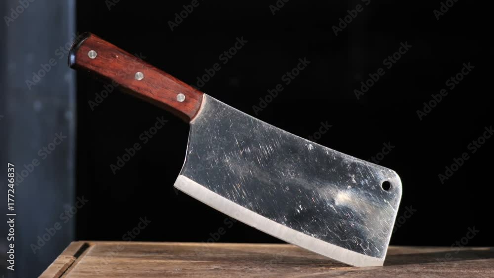 Chef knife through the use in hand. Chef knife through the use in hand.