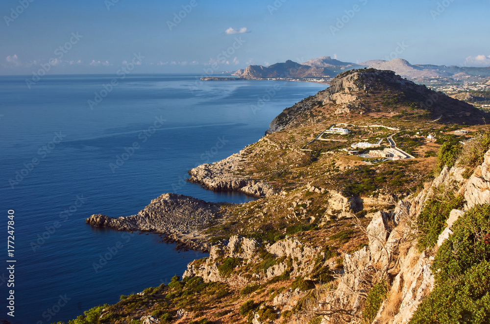 Mountains and rocks on the shore of the Mediterranean Sea on the island of Rhodes.
