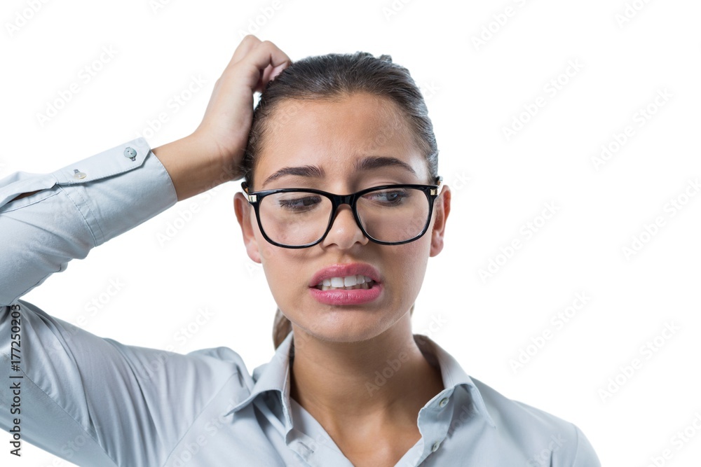 Female executive standing against white background Female executive standing against white background