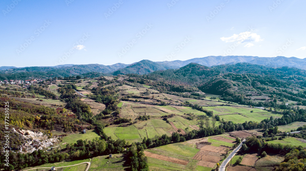 Aerial Shot Of Country Side With Roads In The Mountains At Autumn