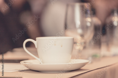 businesspeople hands with pen or pencil , papers and cups of coffee in the seminar room