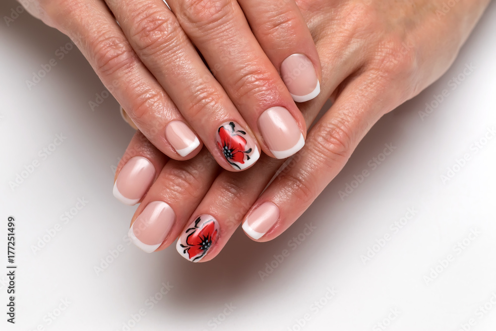 French manicure with painted poppies on short square nails
