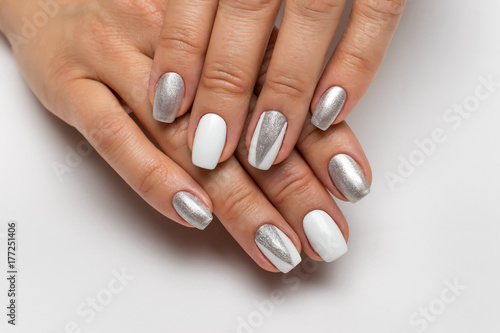 white silver manicure with triangles on square long nails 