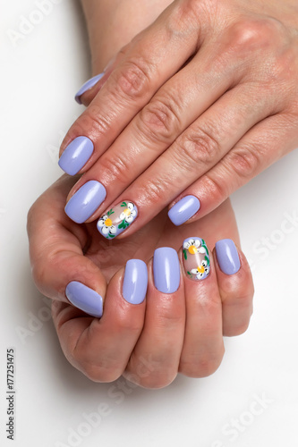 purple  lilac manicure with painted daisies on short square nails  