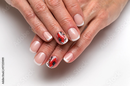 French manicure with painted poppies on short square nails  