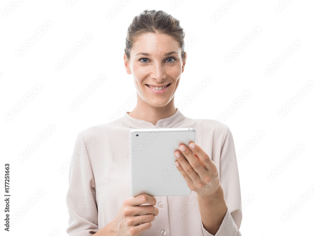Woman using a touch screen tablet Woman using a touch screen tablet