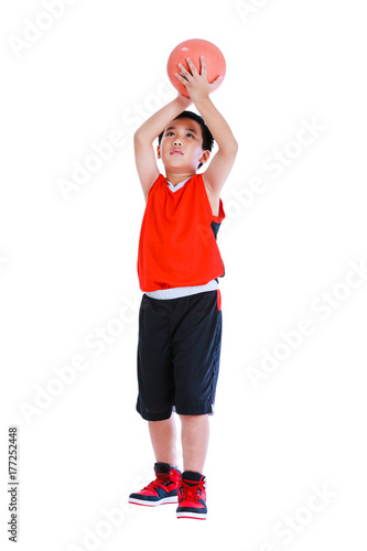 Obraz na płótnie Asian basketball player prepare to throw the ball. Isolated on white background. w salonie