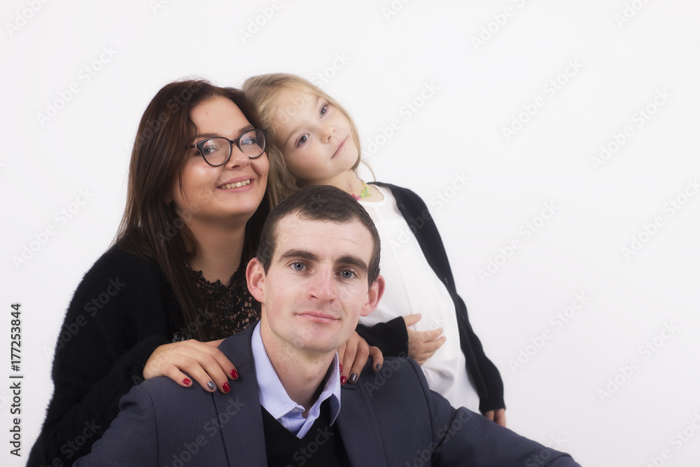 Young family Father, mother and daughter. White background Young family Father, mother and daughter. White background