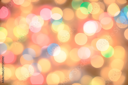 Background Abstract bokeh glitter colorful of light Moving look at the festive decorations Merry Christmas and New Year in holidays night city street .