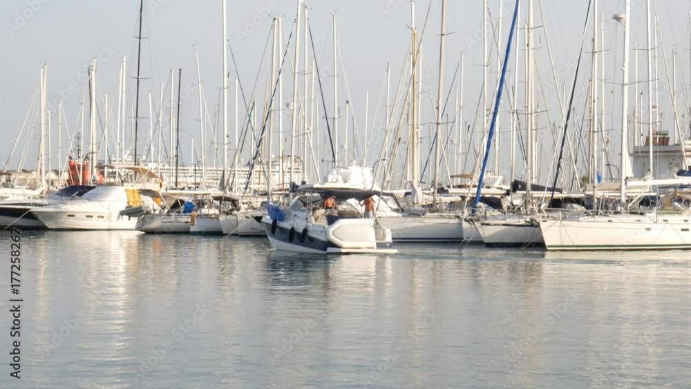 Pleasure motor yacht leaving the harbor in Palma Mallorca Spain Pleasure motor yacht leaving the harbor in Palma Mallorca Spain