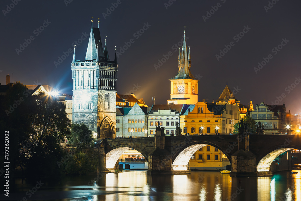 View of  Charles Bridge and Vltava river at night in Prague, Czech Republic