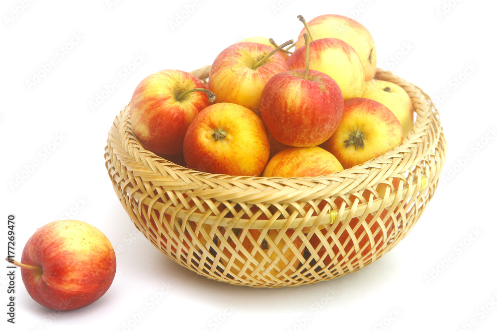 Fresh Little Apples in basket on wihte background Fresh Little Apples in basket on wihte background