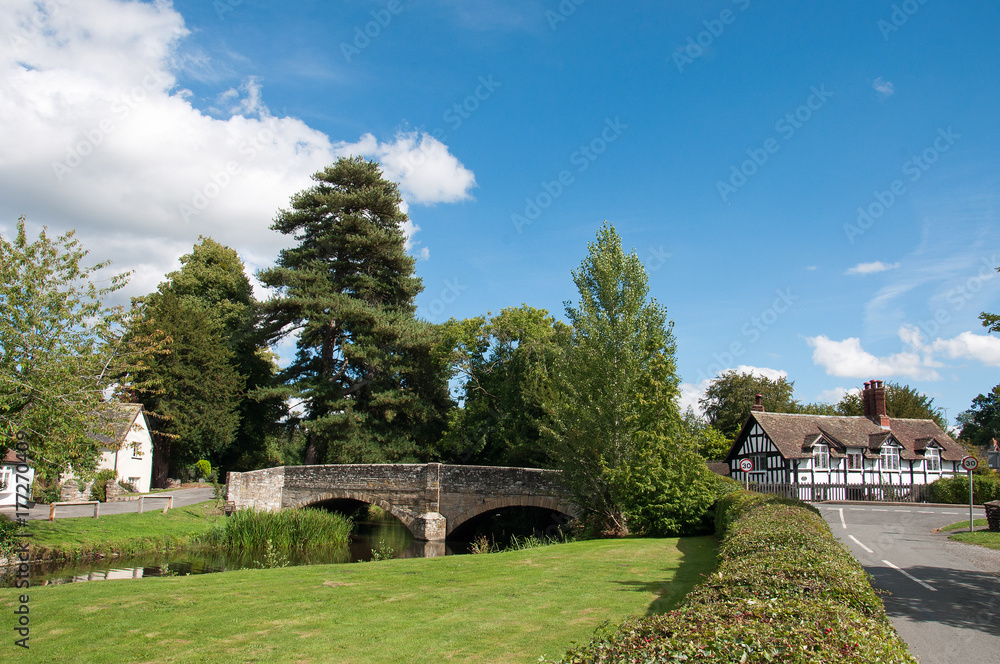 The old bridge in the village of Eardisland, Herefordshire, United Kingdom in the summertime.