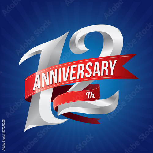 12 years anniversary celebration logotype. 12th silver number with red ribbons on blue background