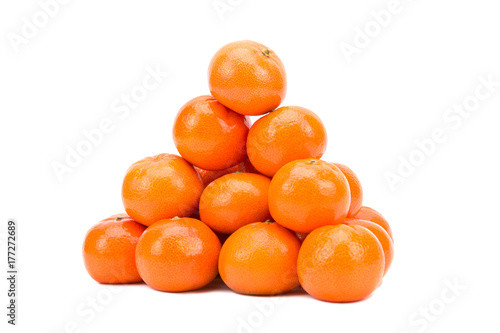 A bunch of fresh tangerines on a white background
