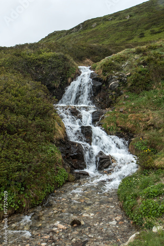 Cascade en montagne , Savoie Alpes , France photo