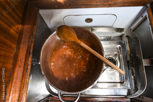 Spaghetti sauce cooked on a yacht photo