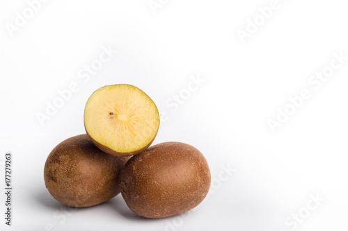 sun gold kiwi fruit on a white background