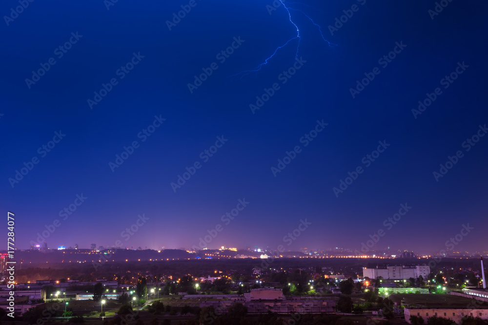 Storm with lightning in the city