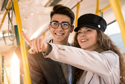 smiling couple in bus